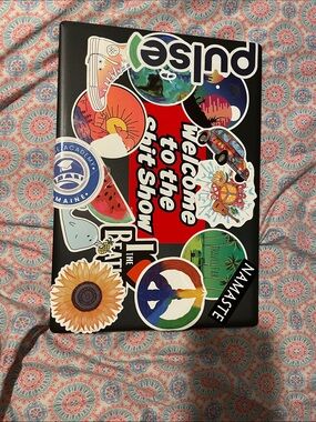 Black Laptop with Colorful Sticker Design - stickers can be removed